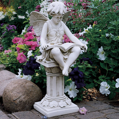 british reading fairy statue